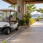 Generic parked golf cart beside an unobstructed resort walkway